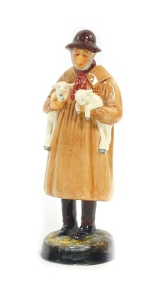 A Royal Doulton figure modeled as Lambing Time HN1890.