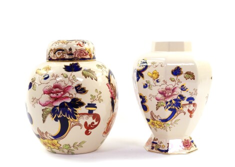 A Masons Ironstone ginger jar and cover decorated in the Mandalay pattern, 24cm high, together with an octagonal vase of baluster form, 23.5cm high. (2)