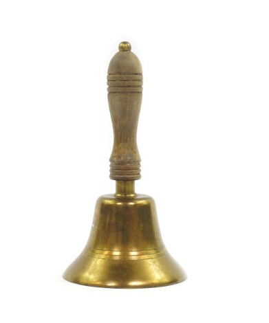 A vintage brass school hand bell, with a turned wooden handle, 24cm high.