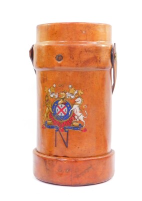 A BH & G Limited early 20thC leather powder keg, No 73 1., showing an armorial to the front and letter N., 3-1929, 39.5cm high.