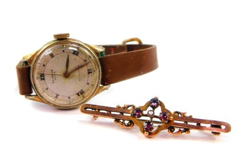 A La Salle mid century lady's wristwatch, circular silvered dial bearing Roman numerals at evens, centre seconds, back plate numbered 117 92849., on a leather strap, together with a Victorian 9ct gold amethyst and seed pearl brooch, 2.2g. (2)