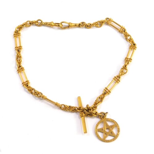 A 9ct gold star medallion, on a gold plated fancy link Albert chain, with T-bar as fitted, the medallion weighing approximately 3.4g.