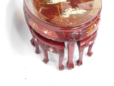 A Chinese red lacquer and 'Shibyama' oval coffee table, decorated with figures and pagodas in a garden setting, raised on six tapering square legs and lion's paw feet, 52cm high, 120cm wide, 77cm deep., together with a Chinese red lacquer and Shibyama set - 3