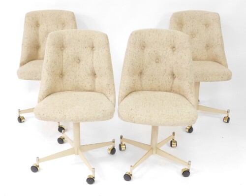 A set of four American late 20thC swivel single dining chairs, upholstered in button back oatmeal fabric, raised on a cream four pronged base, on castors, base numbered 85724, bears label for S***ville Furniture Co, Clarksville, Texas.