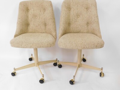 A set of four American late 20thC swivel single dining chairs, upholstered in button back oatmeal fabric, raised on a cream four pronged base, on castors, base numbered 85724, bears label for S***ville Furniture Co, Clarksville, Texas. - 3