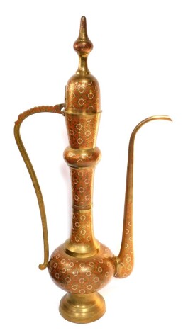 A Mammoth Middle Eastern brass and enamelled coffee pot, decorated with floral motifs, 161cm high.