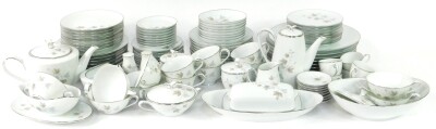 A Noritake porcelain part dinner tea and coffee service decorated in the Harwood pattern, no 6312., printed marks, comprising two oval serving dishes, sauce boat on integral stand, twin handled bowl and cover, further cover, butter dish and cover, eight d