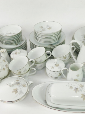 A Noritake porcelain part dinner tea and coffee service decorated in the Harwood pattern, no 6312., printed marks, comprising two oval serving dishes, sauce boat on integral stand, twin handled bowl and cover, further cover, butter dish and cover, eight d - 3