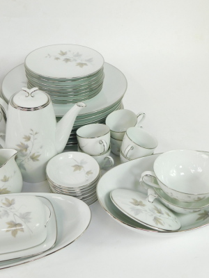 A Noritake porcelain part dinner tea and coffee service decorated in the Harwood pattern, no 6312., printed marks, comprising two oval serving dishes, sauce boat on integral stand, twin handled bowl and cover, further cover, butter dish and cover, eight d - 4