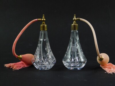 A pair of Stuart cut glass atomisers decorated in the Fuchsia pattern, 16cm high.