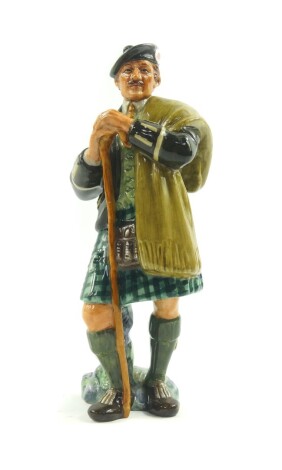 A Royal Doulton figure modeled as The Laird HN2361.