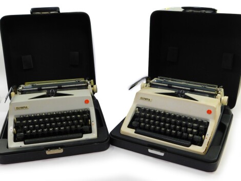 A pair of Olympia typewriters, serial numbers 479943 and 4014630, both cased.