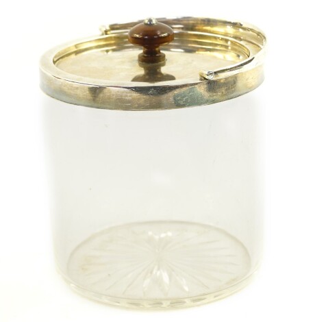 An Edward VII cut glass biscuit barrel, with silver mount, lid and carrying handle, For Wilson & Sharp, 59 Princes Street, Edinburgh, Birmingham 1907, 13.5cm high.