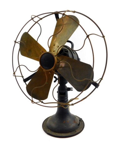 An early 20thC cast iron and brass electric table fan, model no 1230, 34cm diameter.