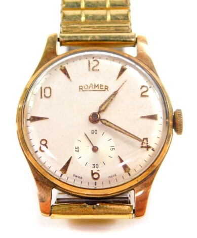 A Roamer gentleman's 9ct gold cased wristwatch, circular silvered dial bearing Arabic numerals at evens, subsidiary seconds dial on an elasticated plated strap.