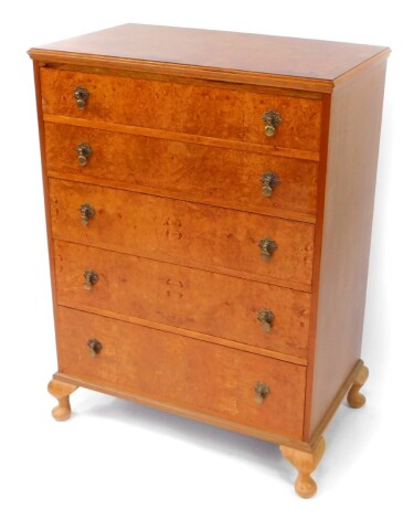 A mid century burr walnut and walnut crossbanded chest, of five long graduated drawers, raised on cabriole legs, 108cm high, 78cm wide, 46cm deep. Auctioneer announce - measurements amended.