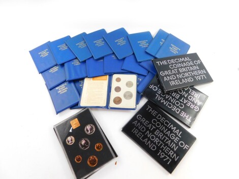 Four proof sets of decimal coinage of Great Britain and Northern Ireland 1971, together with twenty wallets containing Britain's First Decimal Coins. (24)