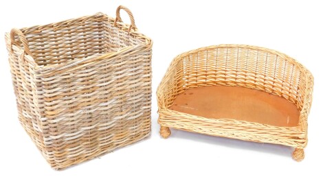 A wicker two handled log basket, 57cm high, 60cm wide, 55cm deep, together with a wicker dog basket, 77cm wide, 52cm deep.