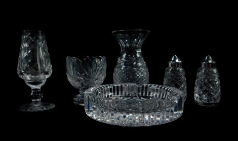 A group of Waterford Crystal, comprising an ashtray, a match holder, vase, 14cm high, sweet meat dish and a salt and pepper. (6)