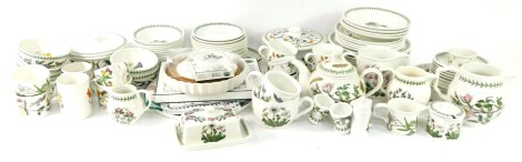 A Portmeirion part dinner tea and breakfast service decorated in the Botanic Garden pattern, including vegetable tureens and covers, dinner plates, fruit bowls, tea cups and saucers, milk and cream jugs, teapot, butter dish and cover, egg cups, preserve p