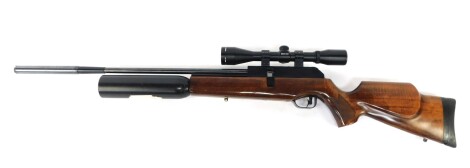 A BSA .177 caliber air rife, with a Parker Hale silencer, and Simmons Prohunter 6x40 gun sight, cased.