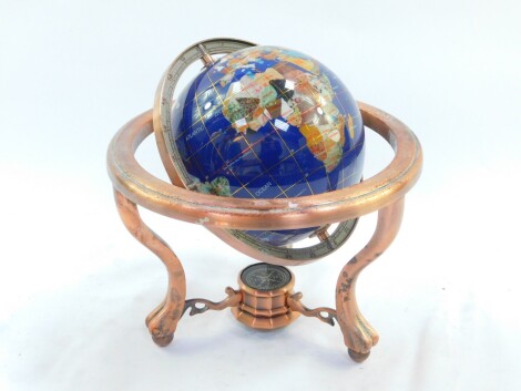 A hardstone terrestrial globe, in a copper gimbal frame, globe 14cm diameter.