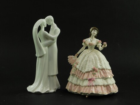 A Coalport porcelain figure of Olivia, Heirloom Figurine of The Year 1997, limited edition no. 716, for Compton and Woodhouse, together with a Wedgwood white glazed porcelain figure, To Have and To Hold, CW45. (2)