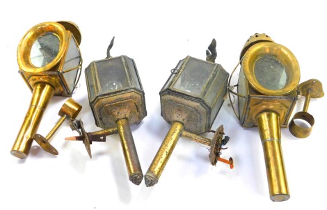 A pair of brass carriage lamps, of canted square form surmounted with eagles, converted to electricity, 37cm high, and a further pair of brass carriage lamp with mounting bracket, 42cm high. (4, AF)