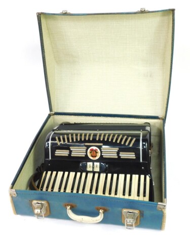 A Calvi piano accordion, 120 button, with clarinet and mastro function, cased.