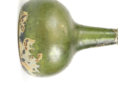 An 18thC green glass onion shaped wine bottle, signs of excavation, 19cm high. - 2