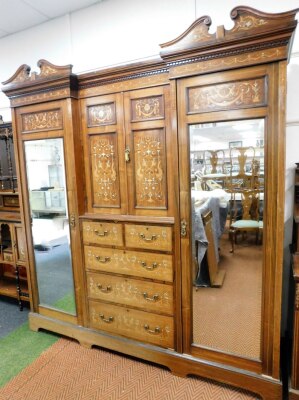 A late Victorian inlaid rosewood bedroom suite, with extensive marquetry in pearwood, satinwood and bone inlays, of a Neo Classical design, comprising wardrobe compactum with double swan necked hood, with dentil moulded cornice, inverted break front centr - 3