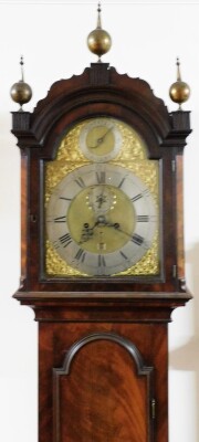 A George III framed mahogany longcase clock, with ball and spike adorned hood, full length trunk door with arch, plain base with bracket feet, the brass square arch dial with silvered silent/strike dial and chapter ring with Roman hour and Arabic minute n