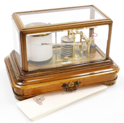 J.J Hicks. An oak cased barograph, the glazed top revealing the barograph with a JJ Hicks maker of London stamp, and single drawer base with brass handles locking key and extra paper, 24cm high, 36cm wide, 23cm deep.