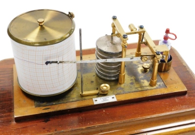 J.J Hicks. An oak cased barograph, the glazed top revealing the barograph with a JJ Hicks maker of London stamp, and single drawer base with brass handles locking key and extra paper, 24cm high, 36cm wide, 23cm deep. - 2