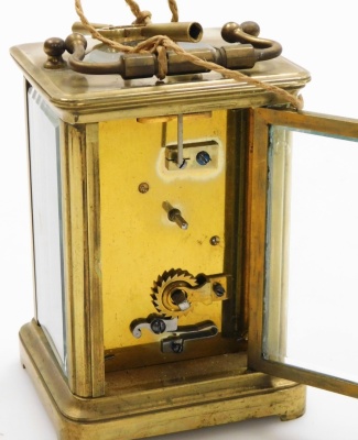 A late 19thC brass cased carriage timepiece, with a rectangular white enamelled dial, with Roman numerals and blue hands, key wind, 11cm high, 7cm wide, 6.5cm deep. - 5