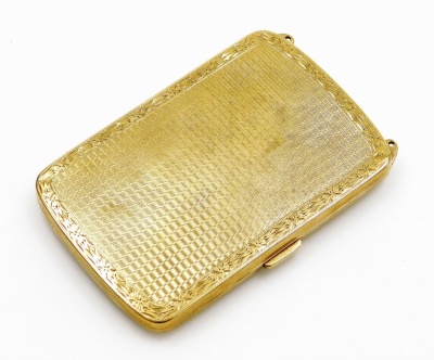 A cigarette case, with engine turned decoration, with floral border and central rectangular section, with clip clasp opening to reveal single elastic section, yellow metal, believed to be 9ct but untested, Birmingham hallmark but rubbed, maker's stamp pos