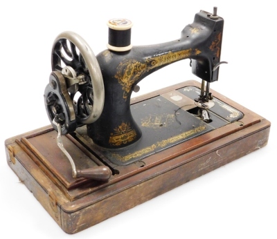 A marquetry sewing table, with musical lift top and a cased sewing machine (2). - 3