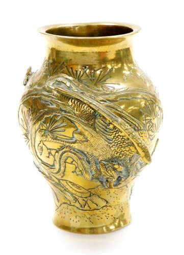 A brass Chinese baluster vase, with applied detailing of storks and vines, with character stamped to underside, 19cm high.