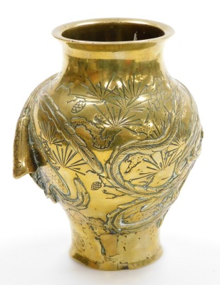 A brass Chinese baluster vase, with applied detailing of storks and vines, with character stamped to underside, 19cm high. - 2