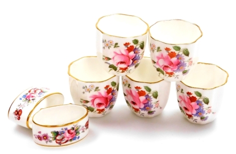 A set of five Royal Crown Derby miniature bowls, in the Derby Posies pattern, with two matching napkin rings. (AF)