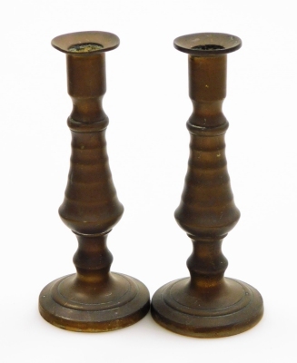 A group of various treen and effects, to include a small treen boot, 8.5cm high, a wooden trinket box depicting the cathedral, two brass candlesticks, miniature magnifying glass and a goblet. (6) - 2