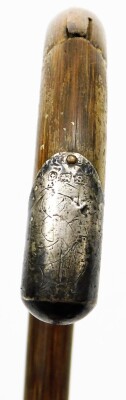 A silver handled walking cane, with single silver cap end and column, Birmingham assay hallmarks rubbed, on a wooden cane, 92cm long. - 3