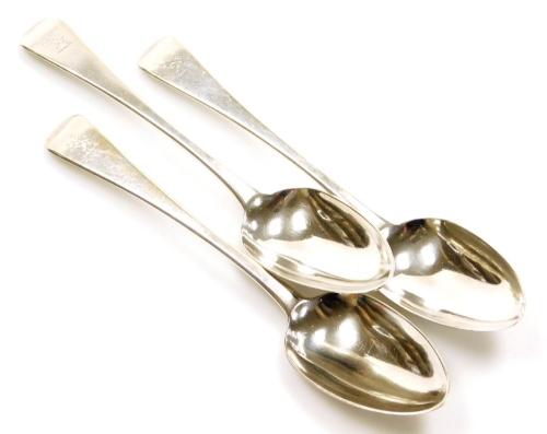 Three George IV silver Old English pattern serving spoons by William Bateman, with a lion rampant crest to top, London 1828, 5½oz.