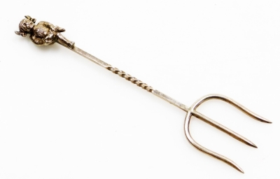 A silver Imp handled toasting fork, the Imp emblem above a three prong fork on a twist stem, maker's stamp TEH, Birmingham 1922, 14.5cm high, ½oz.