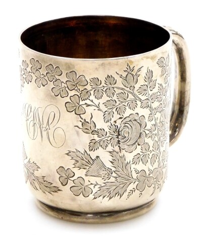 A Victorian silver tankard, with embossed floral decoration, bearing the initials JWC?, London 1890, 8cm high, 4¾oz.