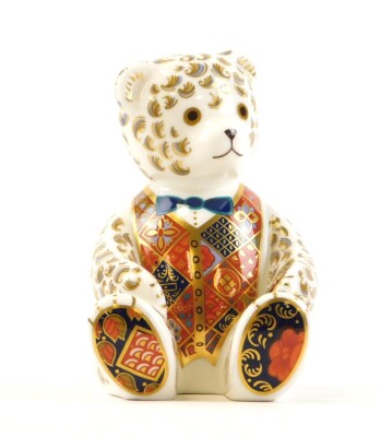 Two Royal Crown Derby paperweights, to include a cat with red stamp numbered LIX with silvered button and a seated teddy bear labelled LX11 with silvered button, 13cm and 12cm respectively. - 2