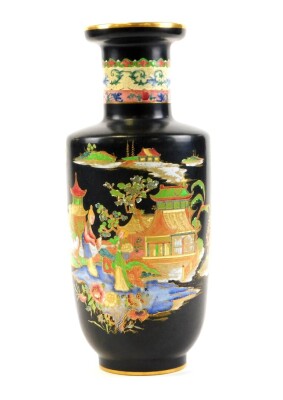 A Carlton ware Eastern style vase, on a black ground with gilt decoration painted with figures and trees in the foreground, 32cm high.