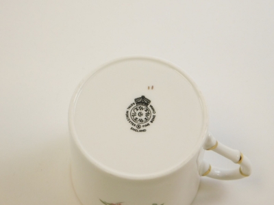 A part set of Royal Worcester coffee cans, comprising six saucers with gilt decoration and floral design together with five associated coffee cans. - 2