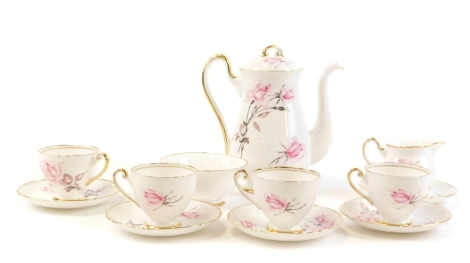 A Shelley bone china part tea service, comprising teapot numbered 14128, milk jug, sugar bowl, four teacups and five saucers.