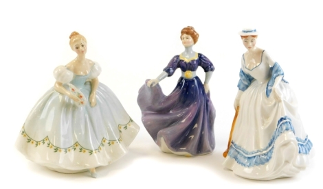 Three Royal Doulton ladies, to include Summertime HN3137, 19.5cm high, First Dance HN2803, 20cm high, and Jacqueline HN2333, 19.5cm hig. (3)